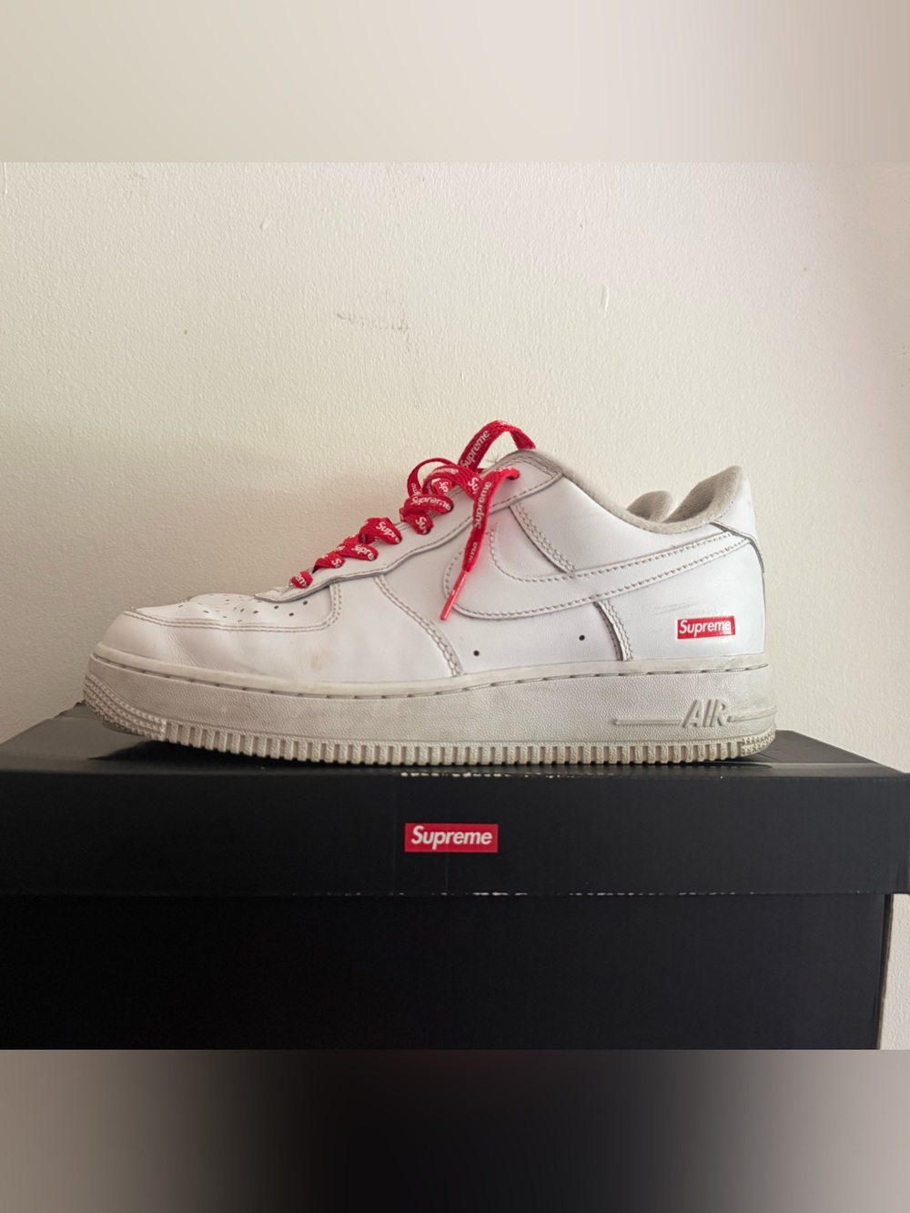 Supreme White Leather Sneaker with Red Accents